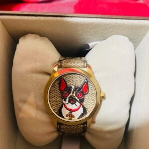 Gucci watch, normal dial. classic style. belt with classic GG and Bosco dial.